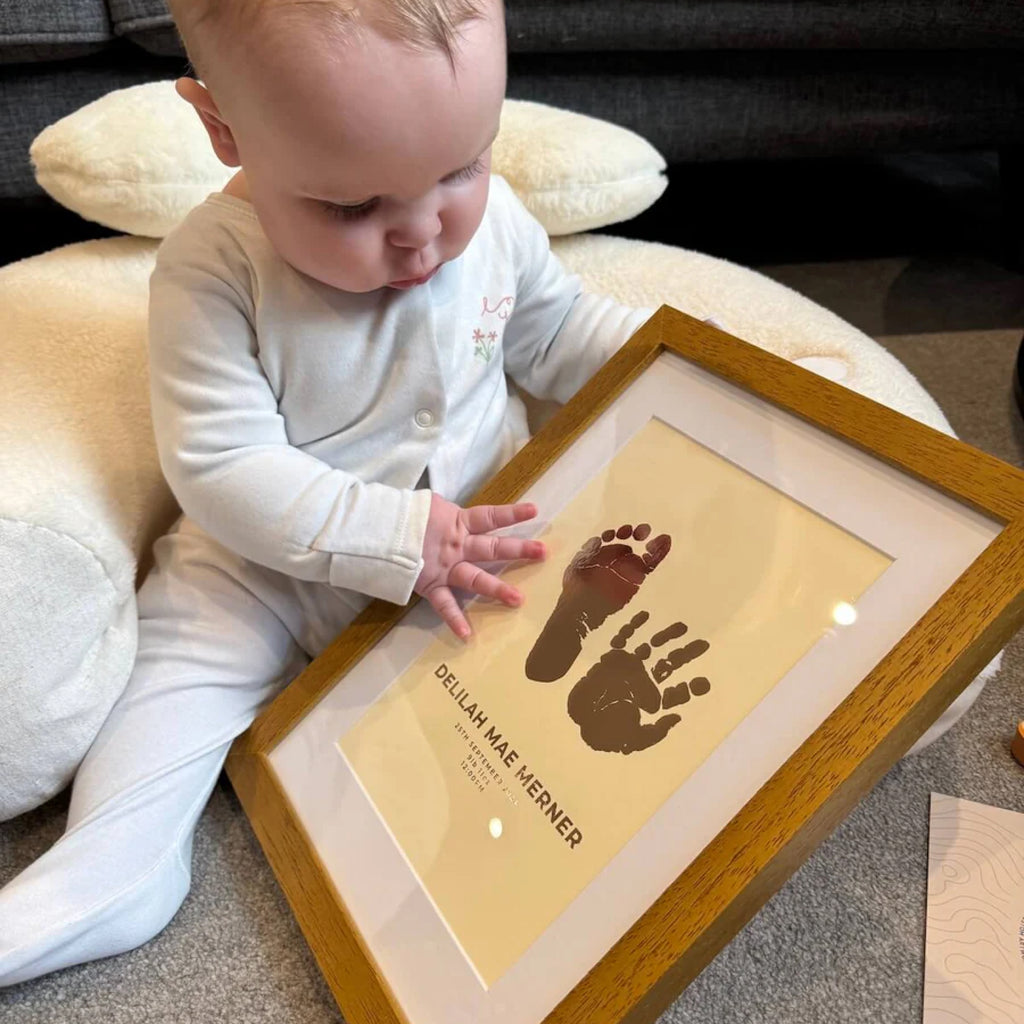 Baby hand- en voetafdruk kunstwerk met foliedruk